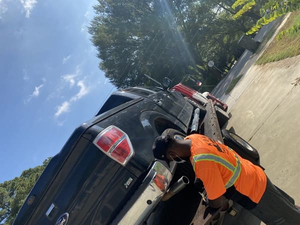Tow truck loading a vehicle